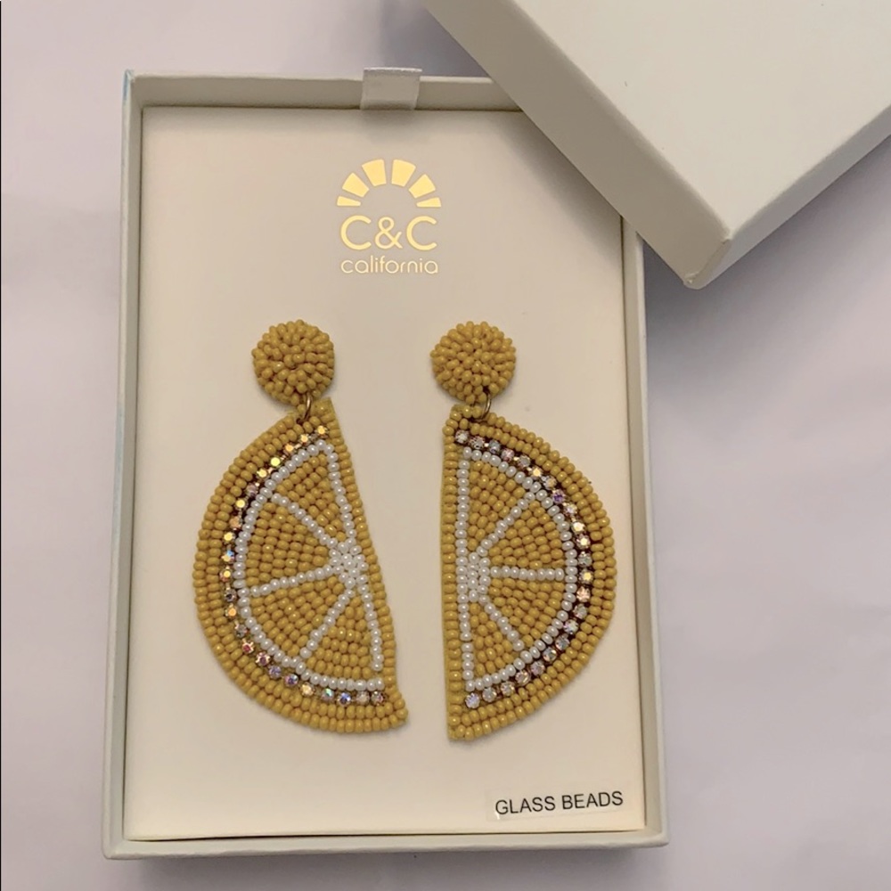 NWT and box! Eye catching lemon wedge earrings!